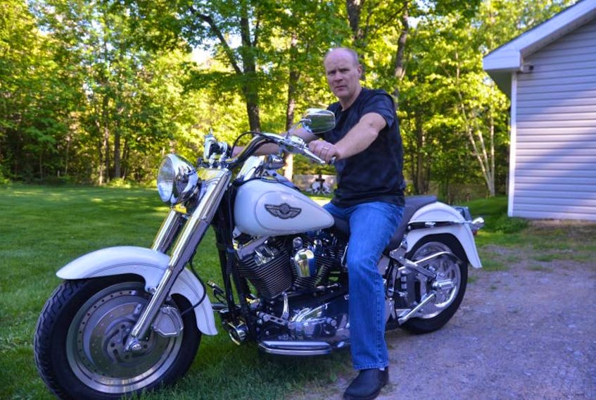 Devil’s Half Acre Motorcycle Event organizer Harlon Wood sits on his Harley Davidson. He hopes that the rally will draw thousands of motorcyclists and enthusiasts to Kentville’s downtown core.