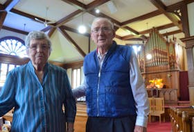 Gladys Martin of Centreville and Lochlan “Bud” Rafuse of Sheffield Mills stand in the sanctuary of the First Cornwallis Baptist Church in Upper Canard. The congregation celebrates its 210th anniversary this year.