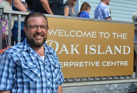 Oak Island historian Kel Hancock of Windsor is pictured by the Oak Island Interpretive Centre prior to co-hosting a tour for Freemasons on Aug. 4.