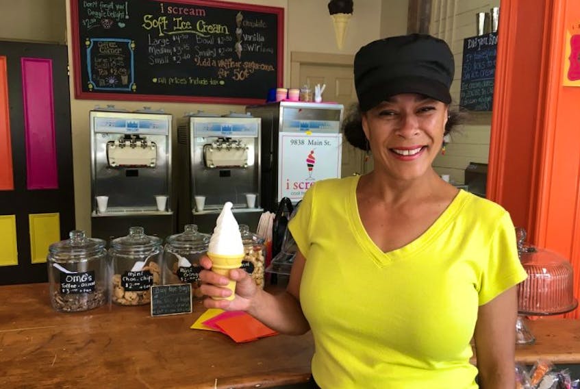 June Granger, owner of i scream in Canning, is hoping to give people something to smile about when they come into her shop.