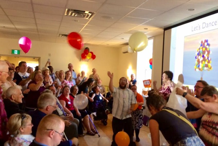Balloons were tossed to celebrate the opening of L'Arche Homefires new building in downtown Wolfville.