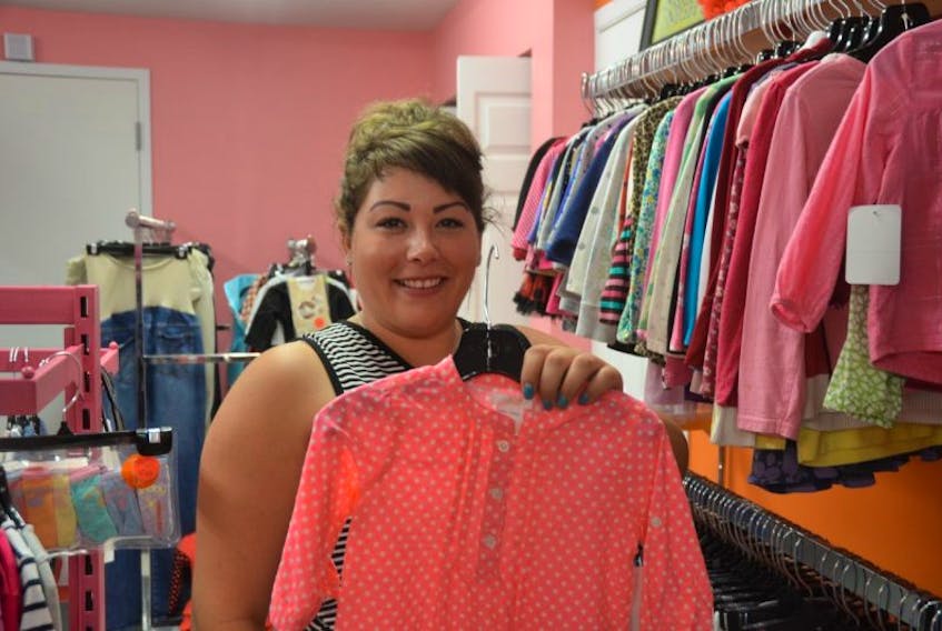 Cherise Dupuis, owner of the newly opened Just Kidding Kids Consignment shop in New Minas, is well-stocked with girls and boys clothing, toys and more. She plans to donate items that go unsold to the Kids Action Program to distribute to local families in need.