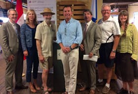 Among those who took part in the ACOA announcement Aug. 23 at the Wolfville Farmers Market were: Acadia University president Peter Ricketts, Holly Bond of Bullfrog Power, vendor Richard Hennigar, MP Scott Brison, MC Chris Callbeck, Mayor Jeff Cantwell and market manager Kelly Marie Redcliffe.