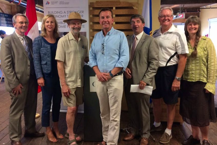 Among those who took part in the ACOA announcement Aug. 23 at the Wolfville Farmers Market were: Acadia University president Peter Ricketts, Holly Bond of Bullfrog Power, vendor Richard Hennigar, MP Scott Brison, MC Chris Callbeck, Mayor Jeff Cantwell and market manager Kelly Marie Redcliffe.