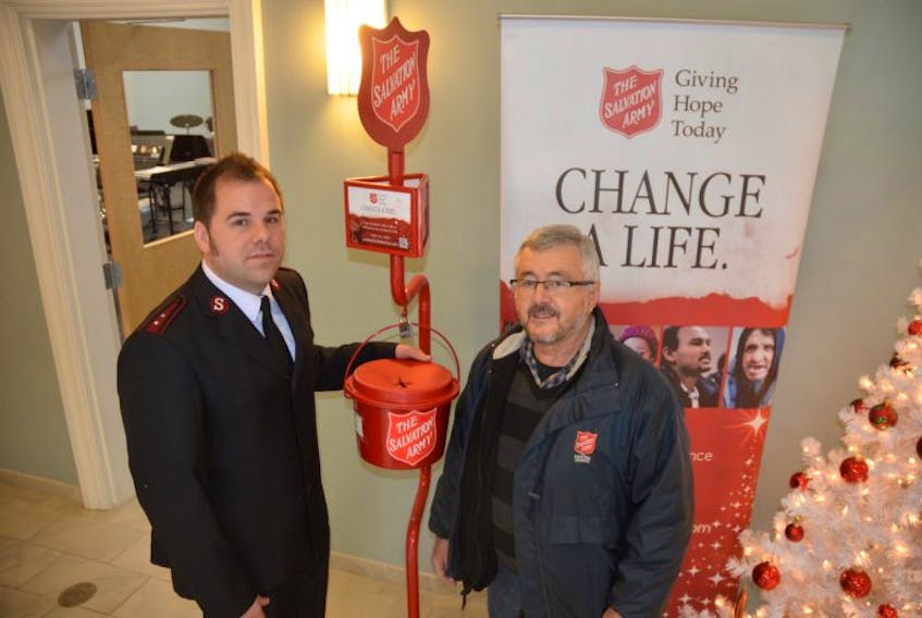 Lieut. Joshua Downer and co-ordinator Les Harris are hoping to recruit new volunteers to make this year’s Kentville Salvation Army Christmas Kettle Campaign the most successful ever. Funds raised help people in need at Christmas and throughout the year.