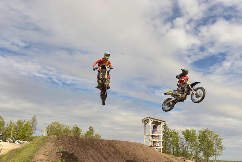 15-year-old Hunter Vaughan of Cambridge practices regularly to master the finer points of motocross competition.