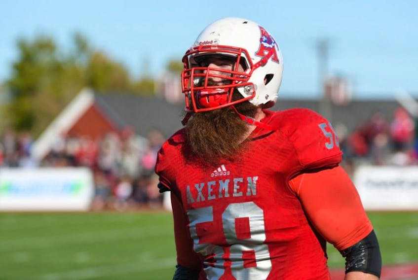 Standout offensive lineman Keiler Cherry is back with the Acadia Axemen for his final university football season. 