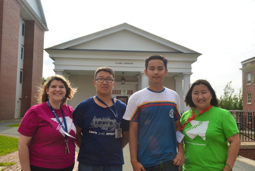 Catapult Leadership Society executive director Lori Barker, left, with members of a delegation from Mongolia that attended the Catapult Leadership Camp. The delegation included students Dashnyam Khudree and Bilegjargal Narankhun and Yanjmaa Jutmaan, the executive director of the Mitchell Foundation.