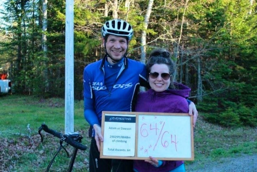 Adam Pearce with his wife Tracy Burgess who presented him with an Everesting certificate. Adam vs Dawson refers to Adam Pearce and Dawson Road.