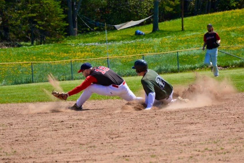 Sean Croft slides into second base during the Shamrocks’ opening game against the Pictou County Albions.