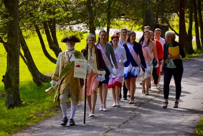 The royal party makes its way to Churchill House in Hantsport before moving on to Windsor near the end of the Apple Blossom Festival.