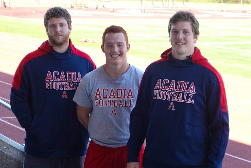 Horton High graduates (left to right) Adam Melanson, Cameron Davidson and Isaac Melanson, as well as their former Horton teammate Brandon Whitman (not pictured), are all part of the Acadia football Axemen roster for the 2017 season.