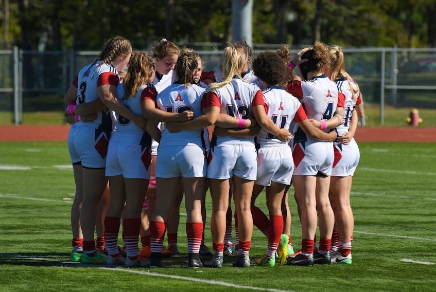 Acadia’s women’s rugby team prepares to face off against Saint Mary’s in recent action. Acadia will host the 2018 national rugby championships. - ACADIA ATHLETICS