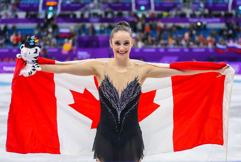 Kaetlyn Osmond celebrates her bronze finish. -Skate Canada
