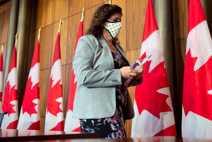 Auditor General Karen Hogan leaves a news conference in Ottawa, Thursday March 25, 2021. 