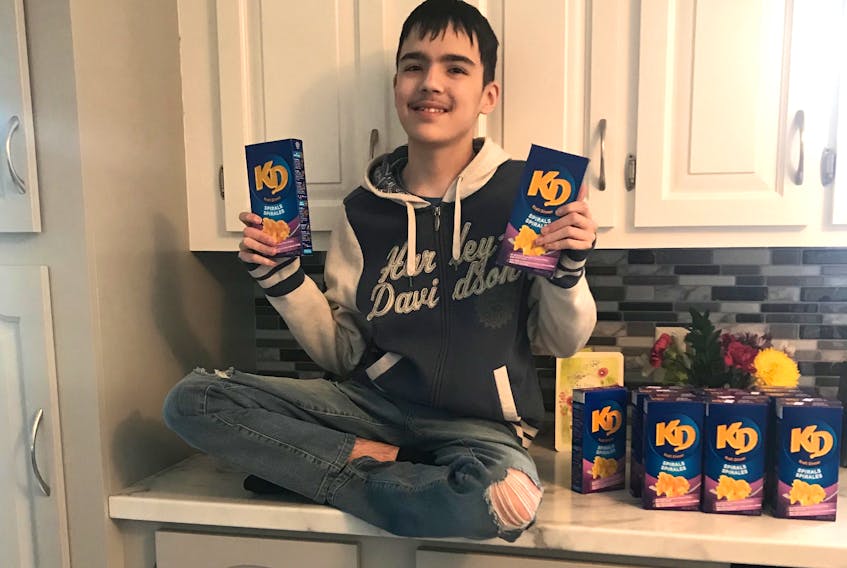 Marcus Robertson of Shoal Harbour is a happy teenager now that he has plenty of Kraft Dinner spirals to eat — thanks to the generosity of people from across the country. — CONTRIBUTED