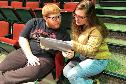 Writer-director Bridget Baldwin, consults with actor Bryan Nash during a recent rehearsal of “Transitions: A Monologue Presentation” which will be on stage Saturday, March 21 at 7:30 p.m. at the CBU Boardmore Playhouse. Contributed