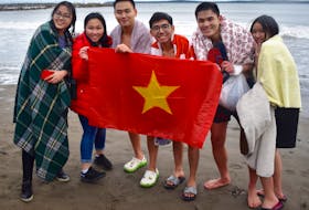 This group of Vietnamese high school students made more memories of their time in Cape Breton as five of the six teens pictured took the New Year’s Day plunge on Jan. 1, 2020 at the annual Port Morien Polar Dip. From left: Mary Uyen Le, Kim Vo, Tuong (Tom) Ngo, Viett Ho, Linh Nguygen and Daisy Vo. CONTRIBUTED
