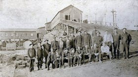 Miners pose for a photo in front of No. 22 Colliery in Birch Grove. Many of the miners were from Port Morien. CONTRIBUTED