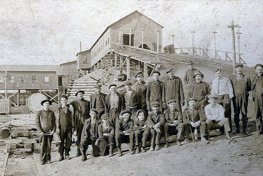 Miners pose for a photo in front of No. 22 Colliery in Birch Grove. Many of the miners were from Port Morien. CONTRIBUTED