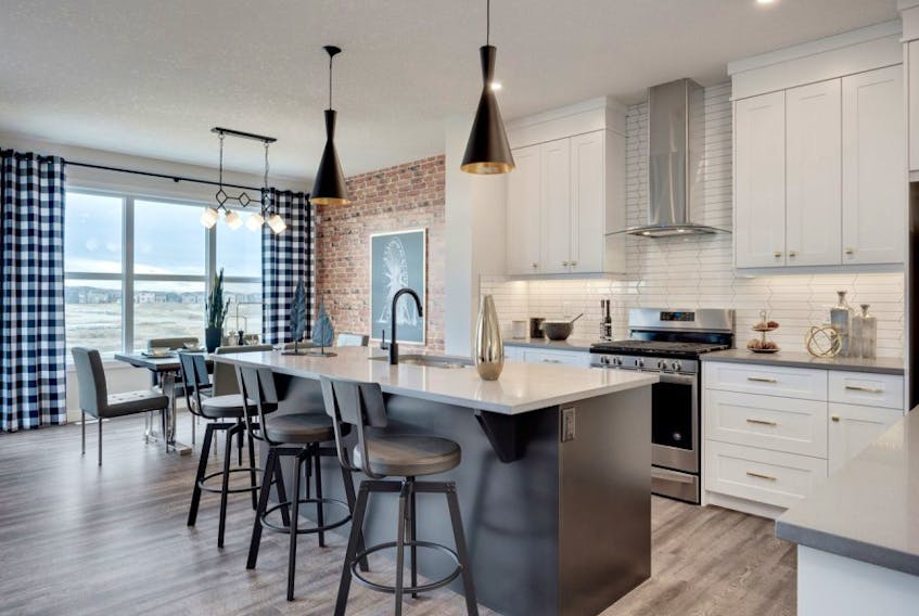 The Kennedy II showhome kitchen in the community of Carrington By Trico Homes.