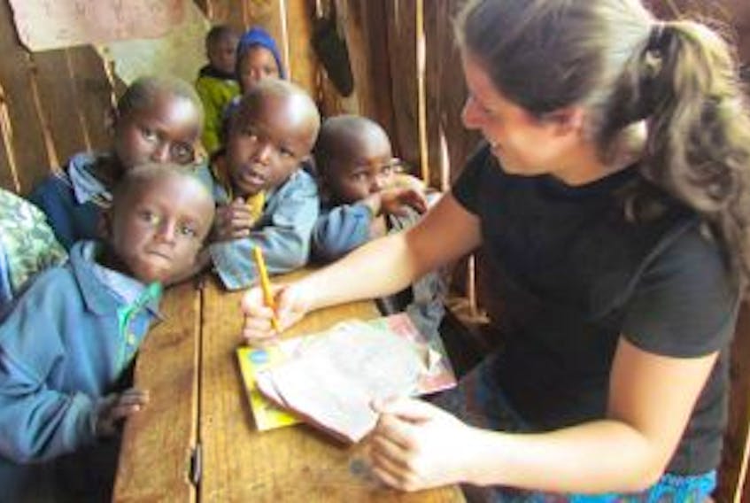 ['<p>Farmers Helping Farmers volunteer and student teacher at UPEI, Meagan Harris, teaches at a school outside of Meru, Kenya, this year.</p>']