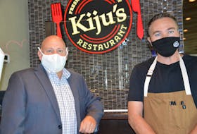 Glen Morrison, left, general manager of the Membertou Trade and Convention Centre, and executive chef Shaun Zwarun oversaw the reopening of Kiju's restaurant on Saturday. OSCAR BAKER III/CAPE BRETON POST