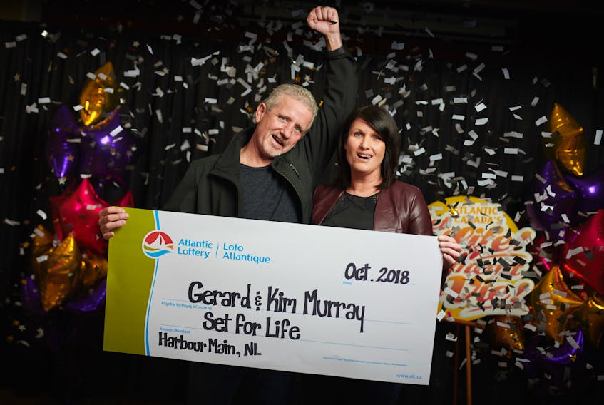 Gerard Murray, with his wife, Kim, won Set for Life and were presented with the cheque by Atlantic Lottery Friday.
