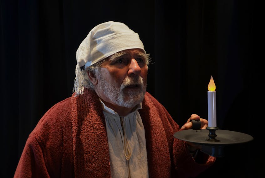 Scrooge (Wayne Currie) is about to have an interesting night at King's Theatre.- Contributed