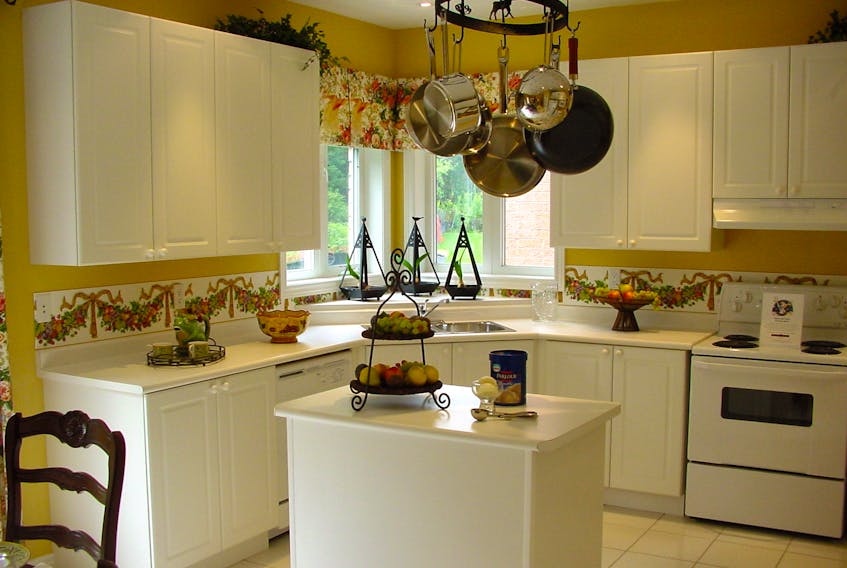 Older kitchen cabinets can take on a whole new fresh look with a coat of brush-applied paint. Surface prep and today’s best latex paints make the job easy.