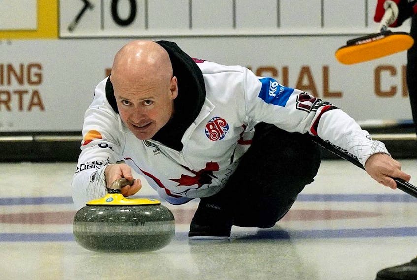 Skip Kevin Koe delivers a rock during game action against Team James Paul at the Alberta provincial men's curling championship held at the Ellerslie Curling Club in Edmonton on Thursday Feb. 7, 2019. 