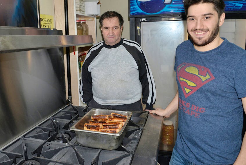 Since January, the Kozy Korner Restaurant has been renovating its new home in the Cornwall Plaza. The business is expected to reopen next week after leaving Prince Street in Charlottetown in February 2017. In this photo, Soubhi Abla, right, and his father, Imad Abla, the owner and cook, stand in front of the new business. TERRENCE MCEACHERN/THE GUARDIAN