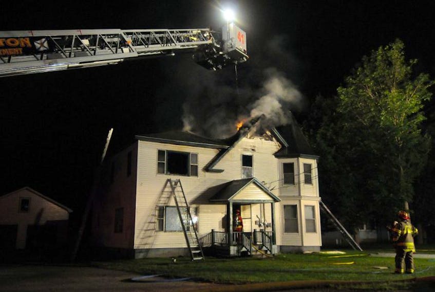 Two occupants escaped with their two pets at a house fire on Main Street in Kingston July 13.