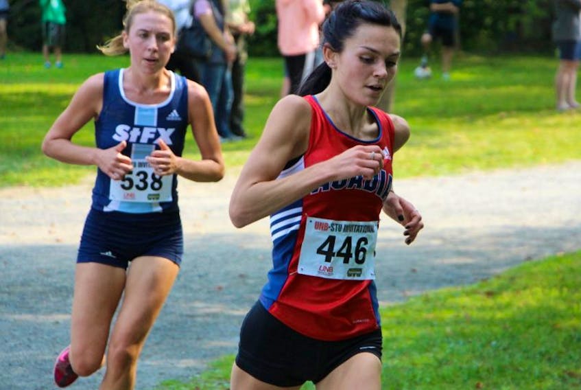 Acadia’s Katie Robertson placed third in the women’s cross country season opener.