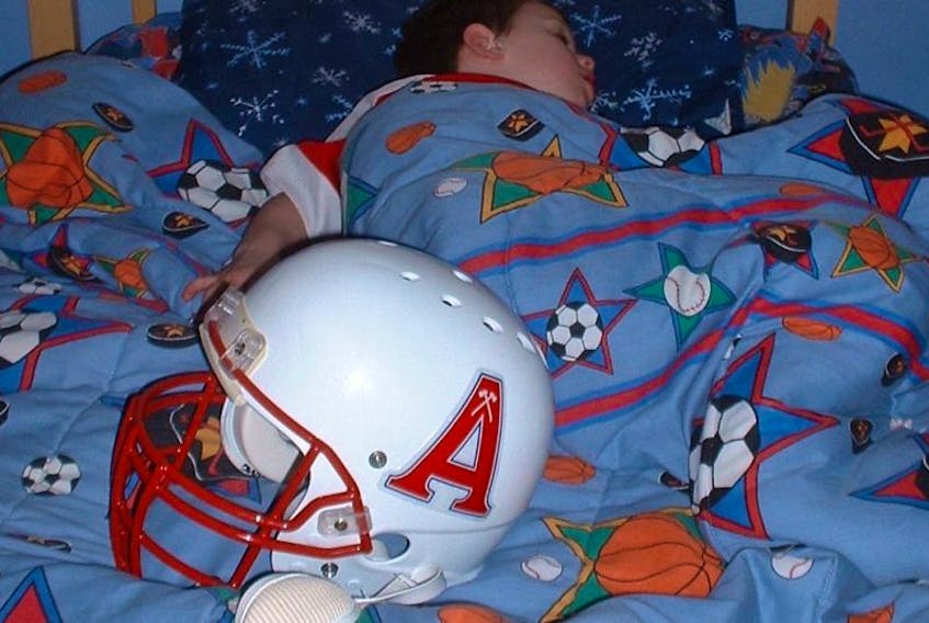 Connor Ross, at age five, had his Christmas dream come true when the Acadia community came together to help bring him a football helmet.