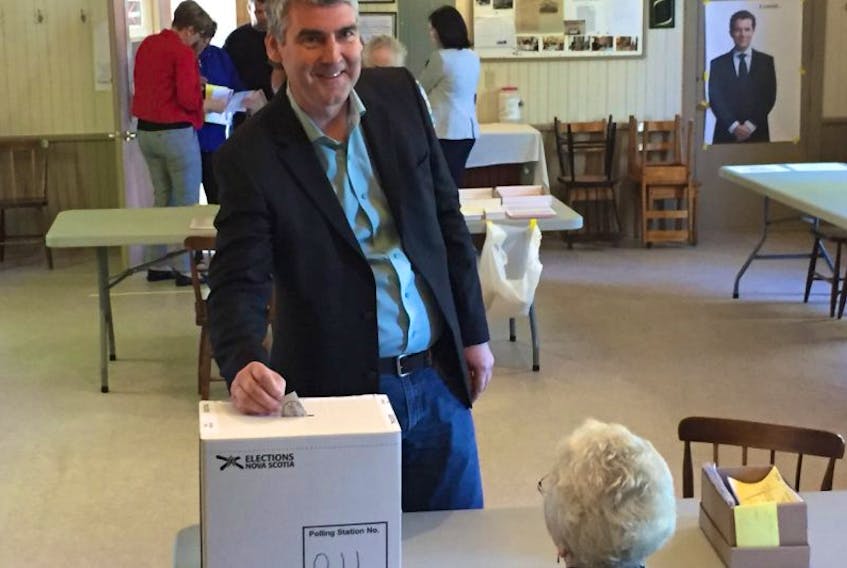 Premier Stephen McNeil was all smiles as he cast his ballot May 30