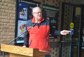 Wolfville Mayor Jeff Cantwell speaks at the heritage property plaque unveiling ceremony for the Acadia Cinema building. - Kirk Starratt