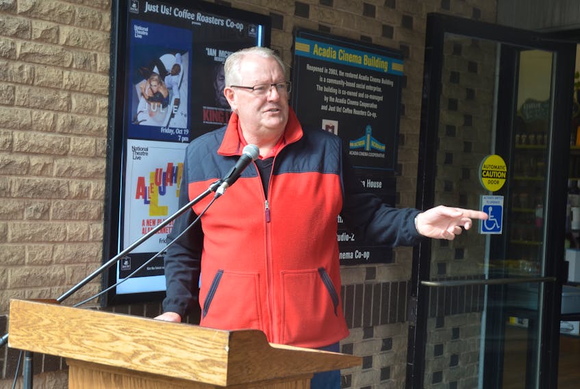 Wolfville Mayor Jeff Cantwell speaks at the heritage property plaque unveiling ceremony for the Acadia Cinema building. - Kirk Starratt