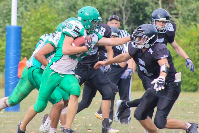 This photo, which ran on front page of the Sept. 14 Annapolis Valley Register, showcases the first high school football game of the year between Central Kings and Northeast Kings. Photographer Jennifer Vardy Little has been nominated for a Better Newspaper award for the shot.