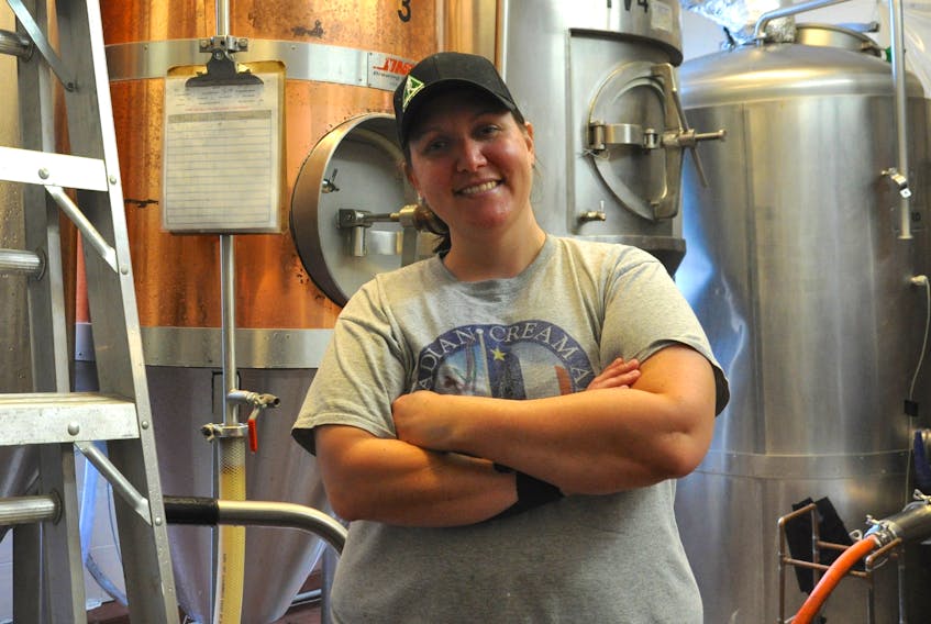 Kirsten MacDonald is the brewmaster at Paddy’s Brewpub in Wolfville. She abandoned her PhD studies in favour of brewing beer fulltime. “I love it that much,” she says.