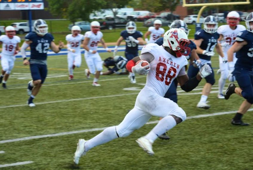 Wide receiver Eugene McMinns had a 94-yard punt return for the Axemen in Acadia’s 38-24 win over St. FX.
