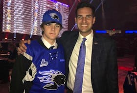 Brady Burns, left, was selected in the second round of the QMJHL draft recently. He is pictured alongside Trevor Georgie, president and general manager of the Saint John Sea Dogs