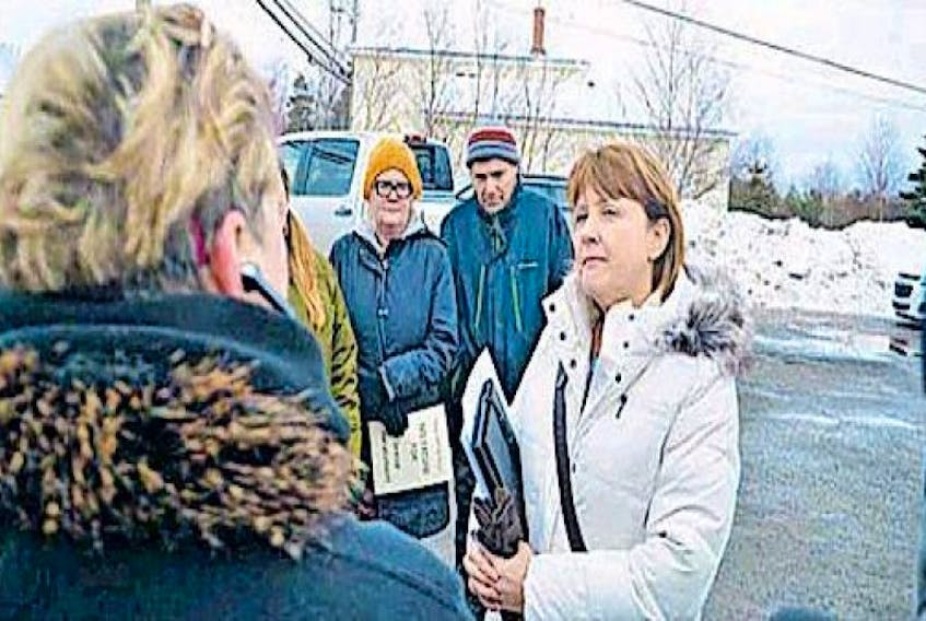 Brenda Seymour (right) speaks with supporters after a recent meeting between the Town of Spaniard’s Bay and representatives of the Department of Municipal Affairs.