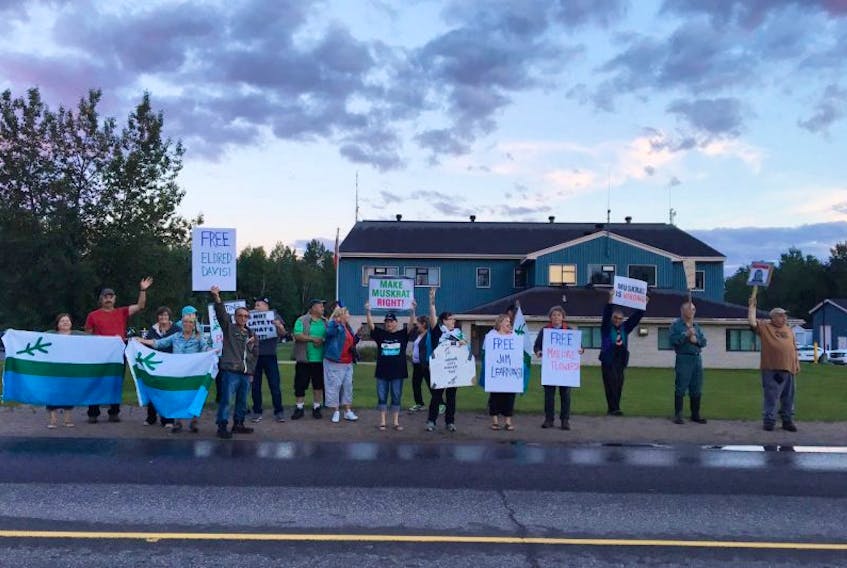 Members of the Labrador Land Protectors held a vigil outside the RCMP station in Happy Valley-Goose Bay on July 21 for three of their members who were arrested that day.