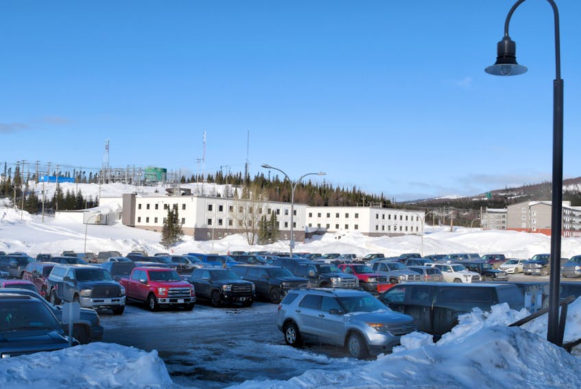 Cars jam the parking lot of the Labrador City Arena as steelworkers get details of latest offer from IOC