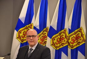 Finance Minister Labi Kousoulis speaks to media before presenting his 2021-22 Nova Scotia budget in Province House on Thursday, March 25, 2021.