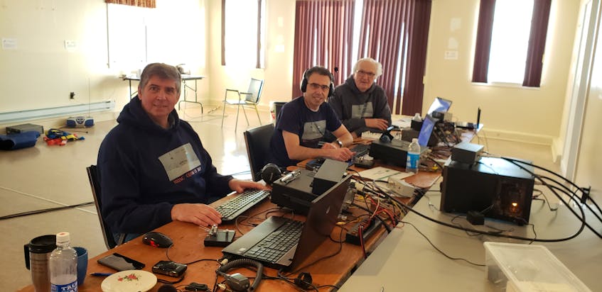 Amateur radio operators (from left) Dave Goodwin, Chris Allingham and Frank Davis were at VO2AC Point Amour Lighthouse, Labrador, in January to participate in an international competition. See story Page A6. — CONTRIBUTED 