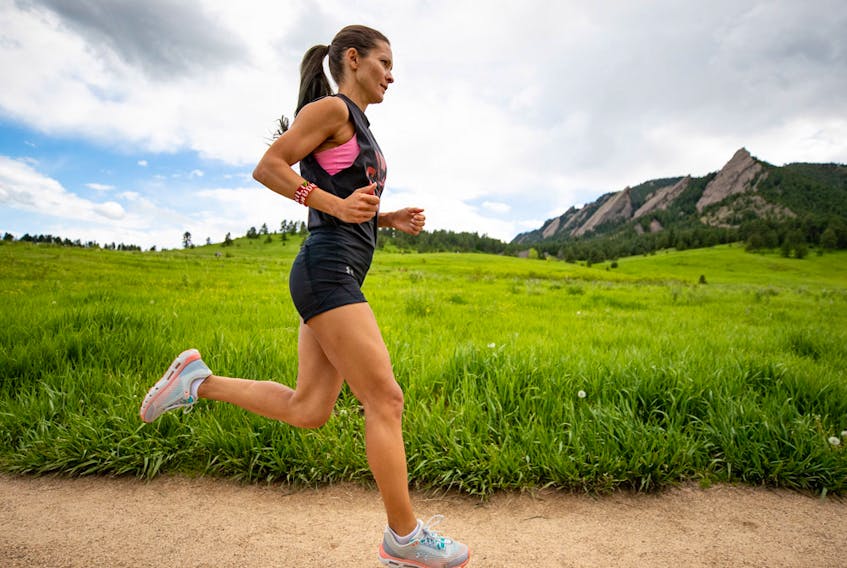 Lanni Marchant runs along the Flatirons in Boulder, Colorado.