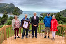 It was a special moment for all when Ralph Joyce (second from left) of Lark Harbour was presented with a Newfoundland and Labrador Bravery Award. Also pictured are his wife, Linda Robinson (left), Humber-Bay of Islands MHA Eddie Joyce, John Parsons, the man he rescued, and Sharon Parsons. 