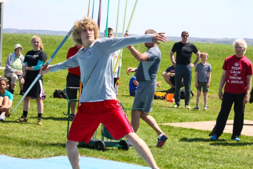 <p>NKEC student Owen Hebb competes in the javelin as part of the Throwing for Autism meet May 16 in New Minas. Hebb, normally a runner and jumper, has taken up javelin, discus and shot put this year as part of his quest to compete in the decathlon, which includes throwing events.</p>